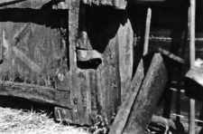 A bottom hinge at a barn doors
