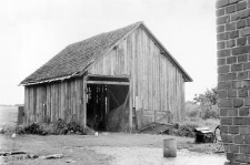 A barn with a narrow facade