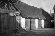 A barn with a pigsty