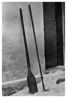 Tools for putting in loaves of bread and for removing embers from the bread oven