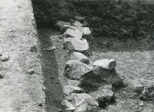 Fragment of the stone foundations of the collegiate church nearby the eastern wall of the trench