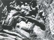 Deep trench outside the collegiate church (from the south), wooden structure of the rampart from the east, view from above on the trench during examination